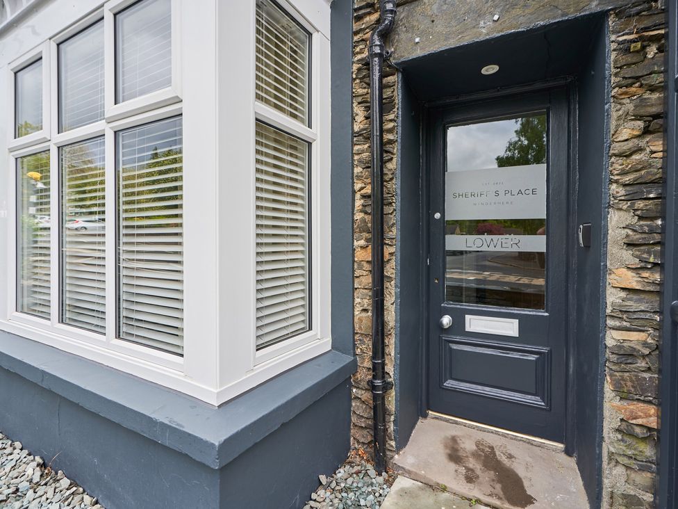 The exterior entrance door and windows of Lower Sheriff's Place in Windermere