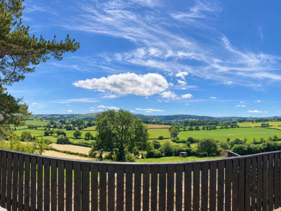 A landscape view with greenery and hills at Tyddyn Elidir near Old Colwyn