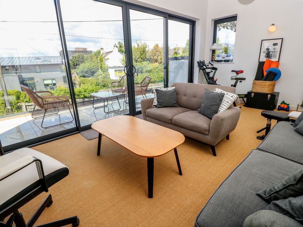 A living room with a sofa and coffee table at Aquanaut in Gurnard