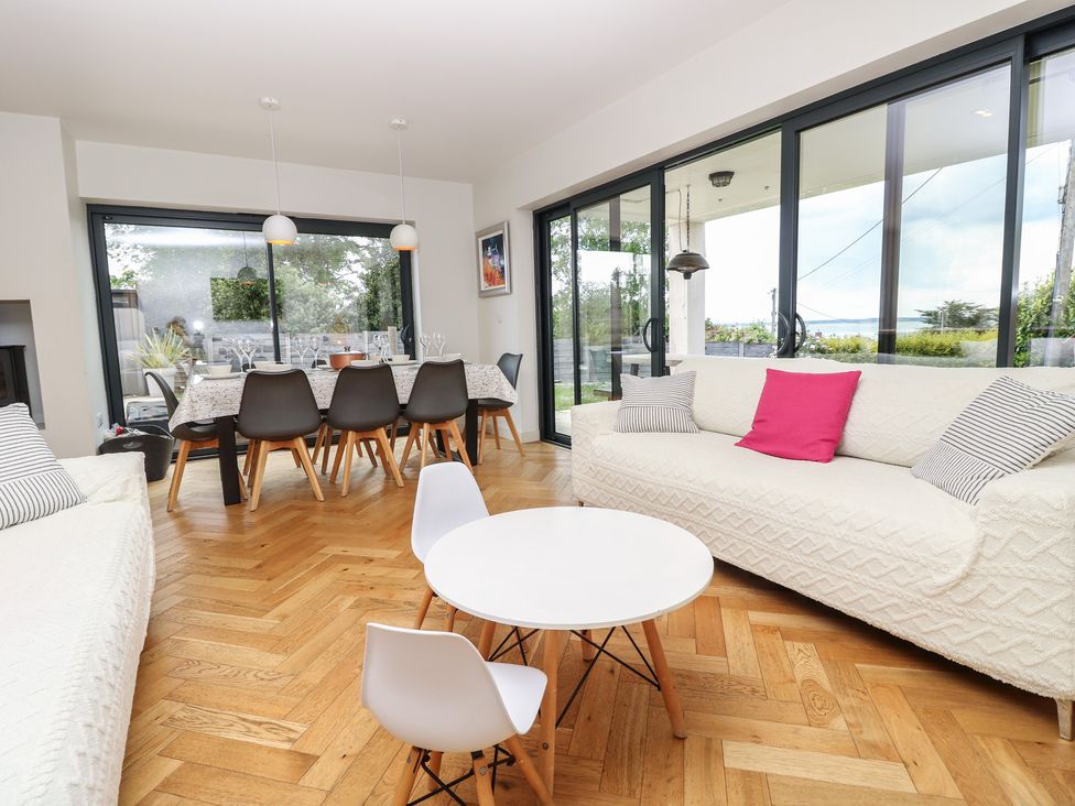 A living room with a sofa and coffee table at Aquanaut in Gurnard