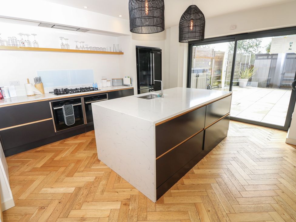 A kitchen with a countertop and appliances at Aquanaut in Gurnard