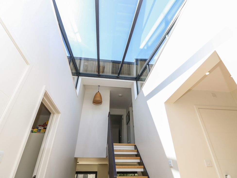 A staircase with a glass ceiling at Aquanaut in Gurnard