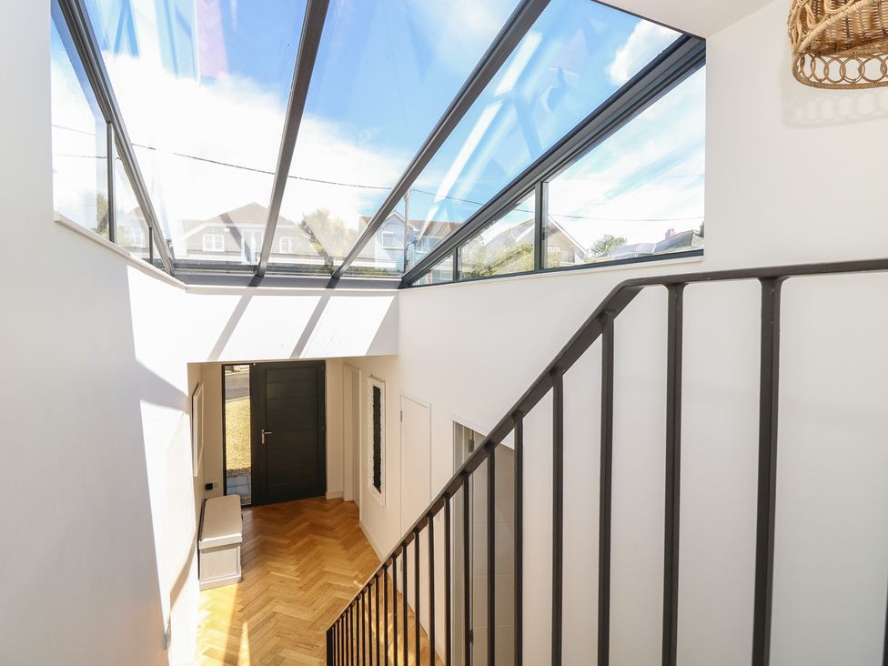 An entrance with a staircase and door at Aquanaut in Gurnard