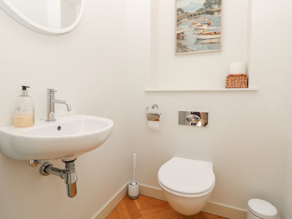 A bathroom with a sink and toilet at Aquanaut in Gurnard