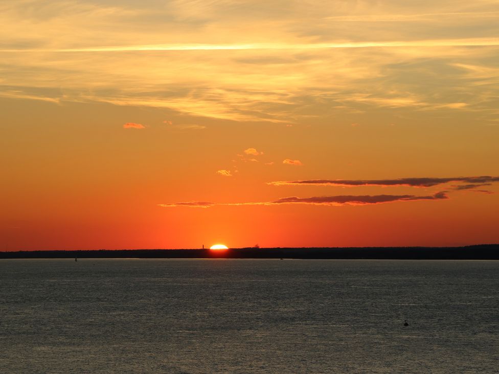 A sunset over the ocean at Aquanaut in Gurnard