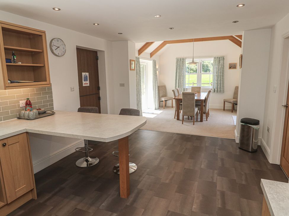 A kitchen with a dining area at Ilgram in St Newlyn East