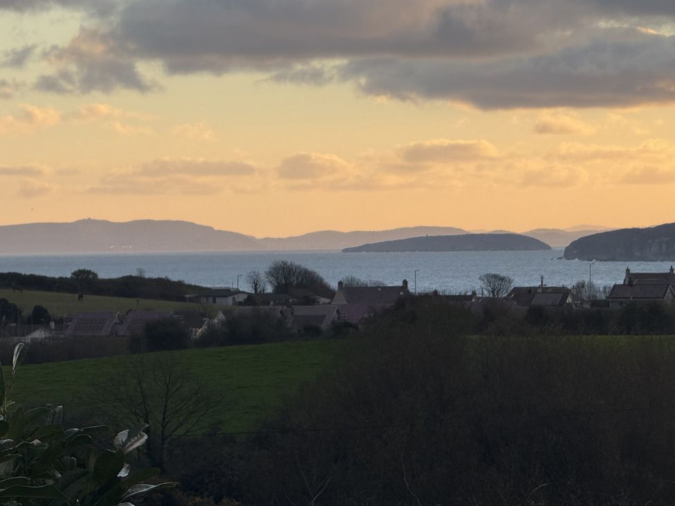 A view of the sea and islands from a residential area at Caledfryn in Benllech