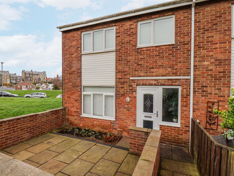 An exterior view of a house with windows and a door at 34 Fountain Close Whitby