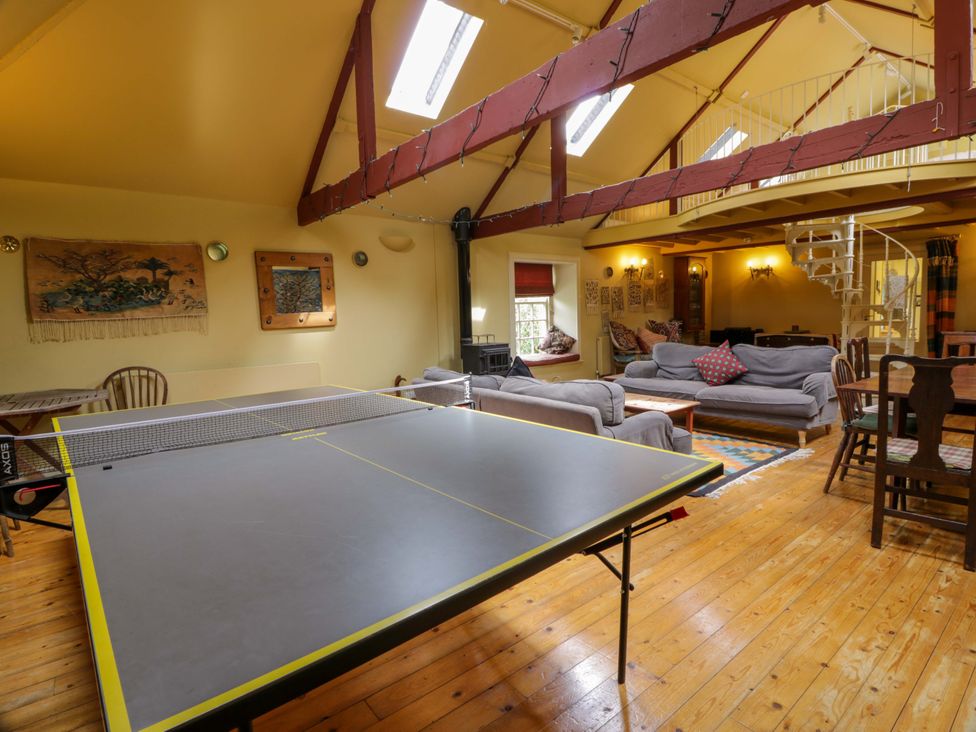 A living room with a table tennis table at Townhead of Auchenbainzie near Thornhill