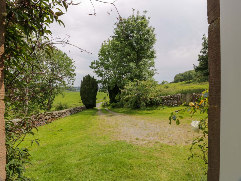 A garden view with a path and greenery at Townhead of Auchenbainzie near Thornhill