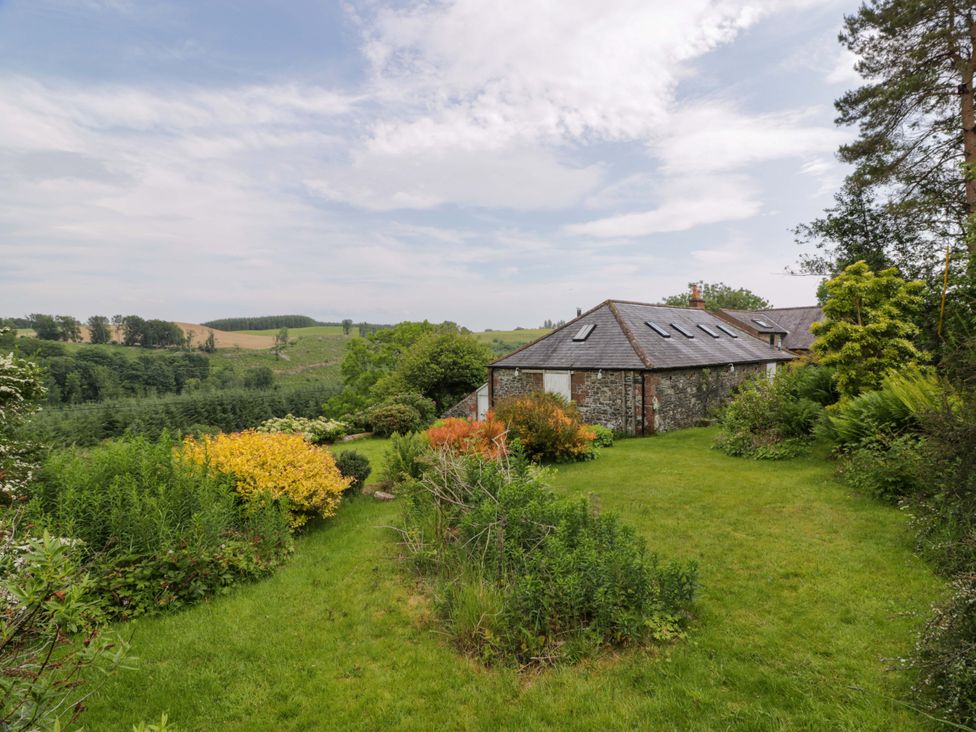 A house surrounded by gardens at Townhead of Auchenbainzie near Thornhill