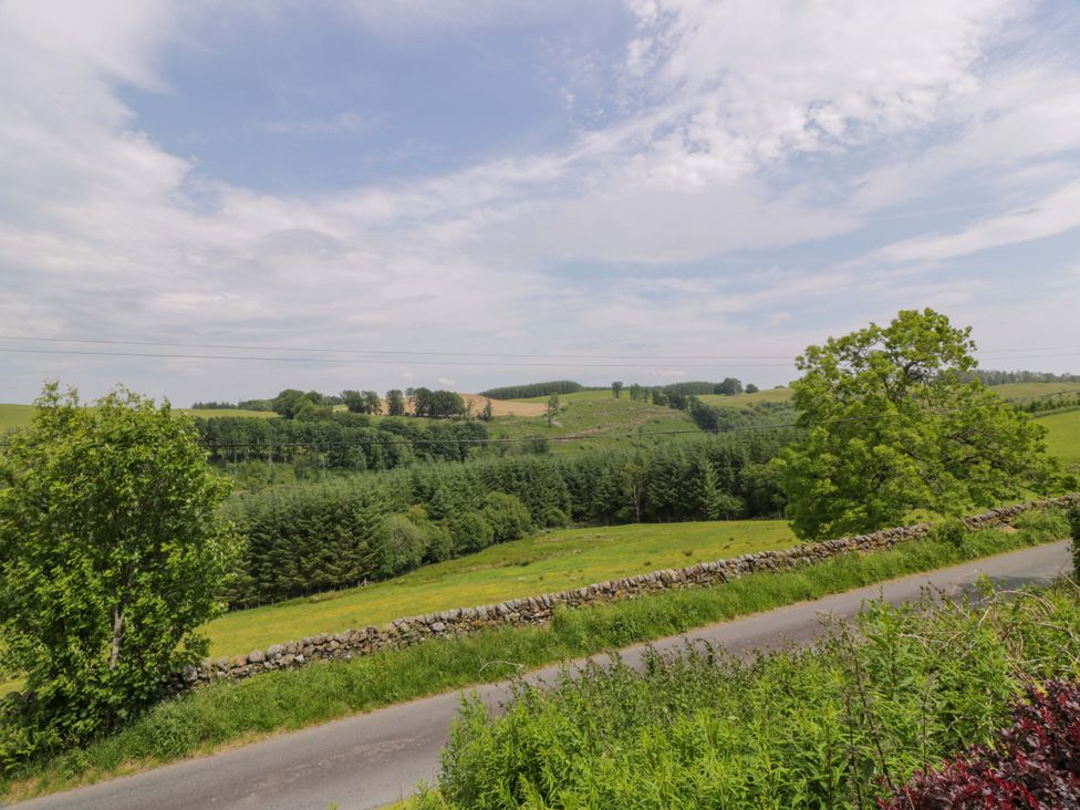 A landscape view with rolling hills and greenery at Townhead of Auchenbainzie near Thornhill