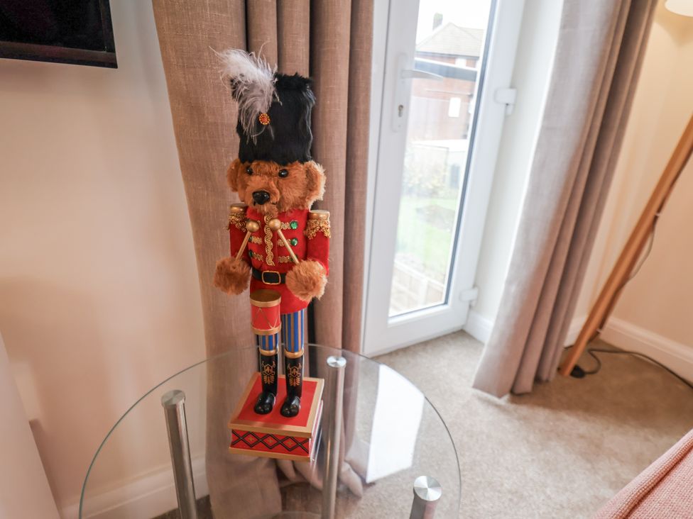 A decorative figure on a glass table in the living room at Weydale Avenue, Scarborough
