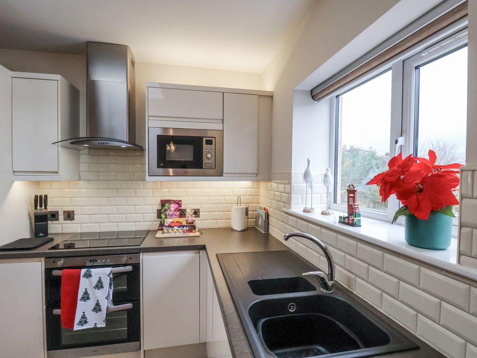 A kitchen with appliances and decorations at Weydale Avenue in Scarborough