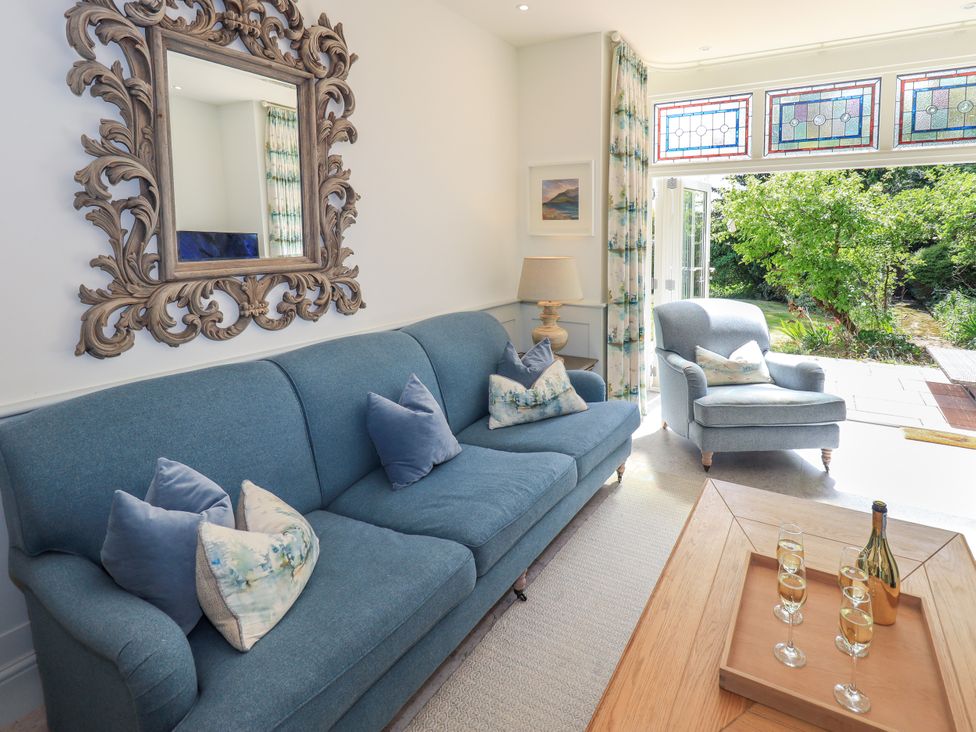 A living room with a sofa and a coffee table at Fern Bank in Penrith
