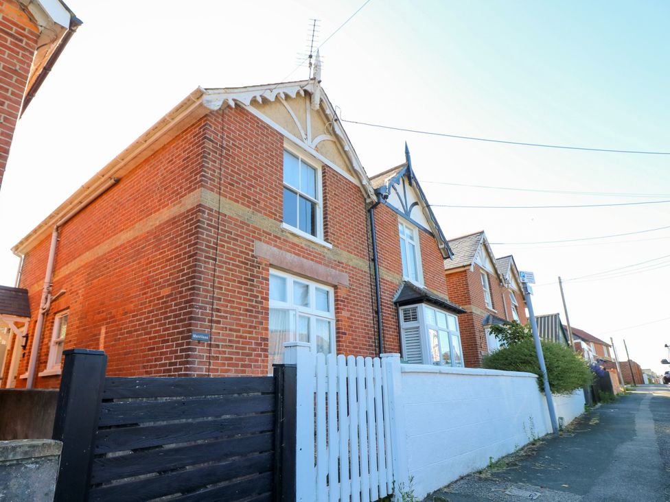 A house with windows and a brick facade at Merrilees in Yarmouth