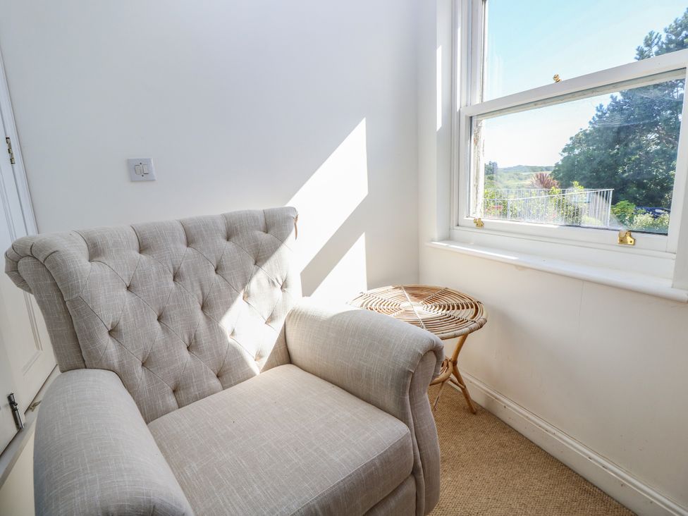 A snug with a chair and window at Merrilees Yarmouth