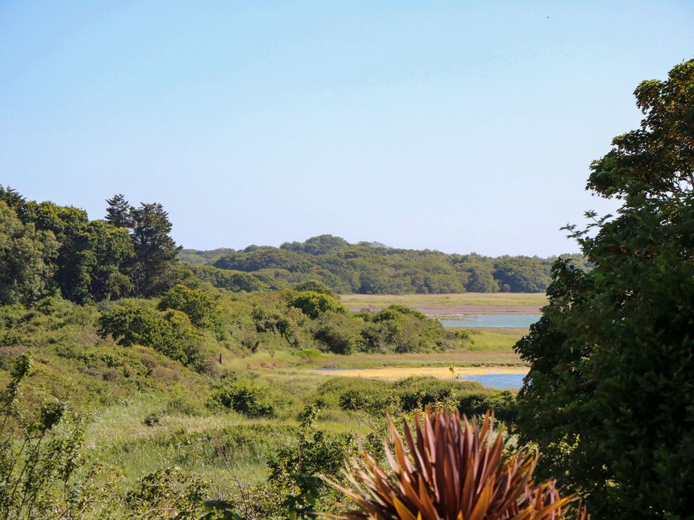 A view of trees and water in a landscape at Merrilees Yarmouth