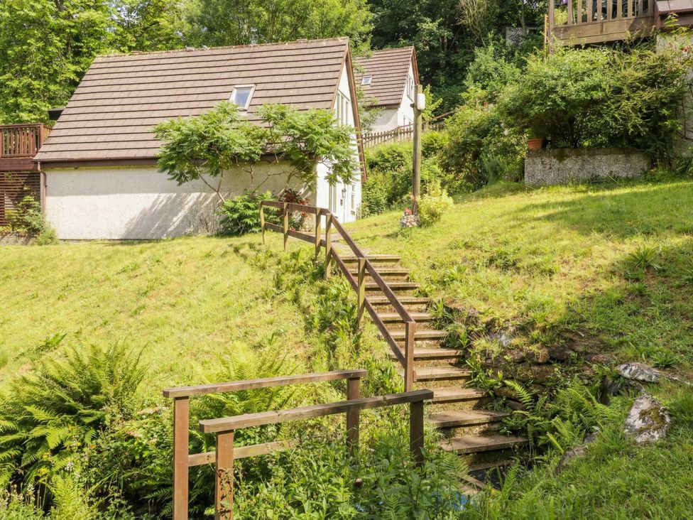 A house with steps leading to a garden at Lavender Lodge in St. Ann's Chapel, Cornwall