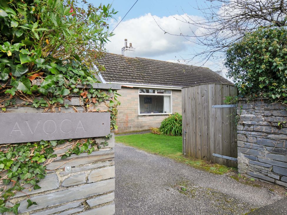 A house entrance with a gate and sign at Avoca in Rock