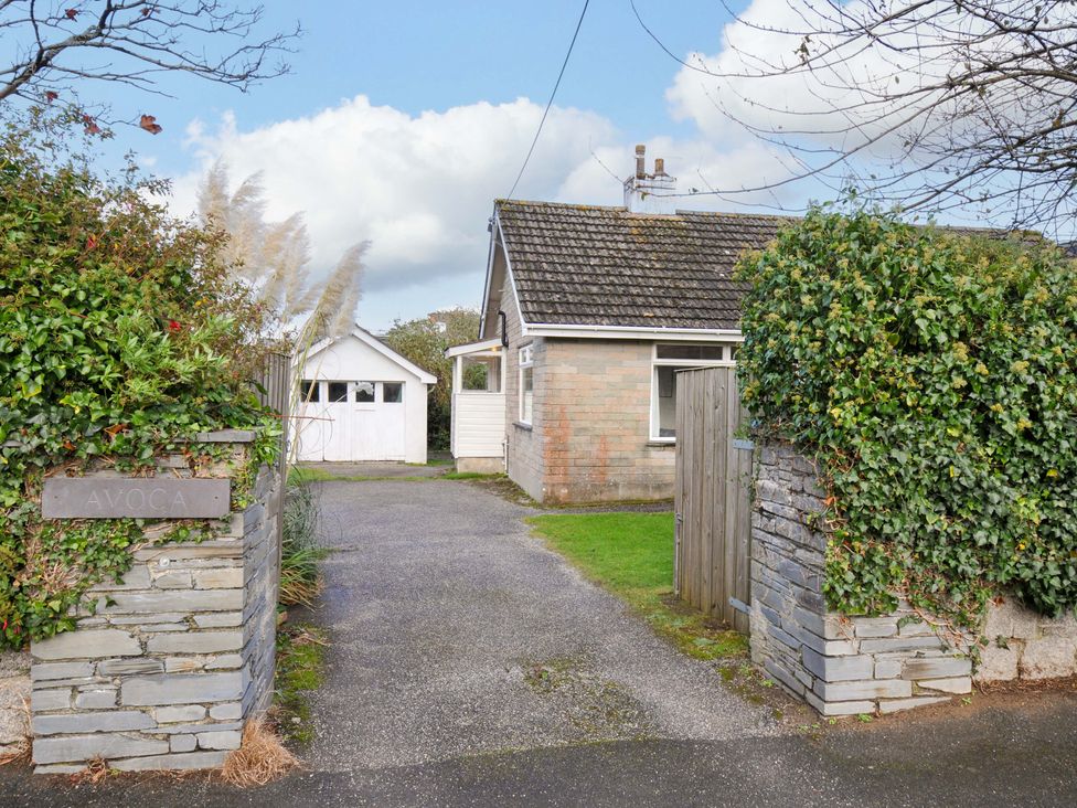 A house with a garage and pathway at Avoca in Rock