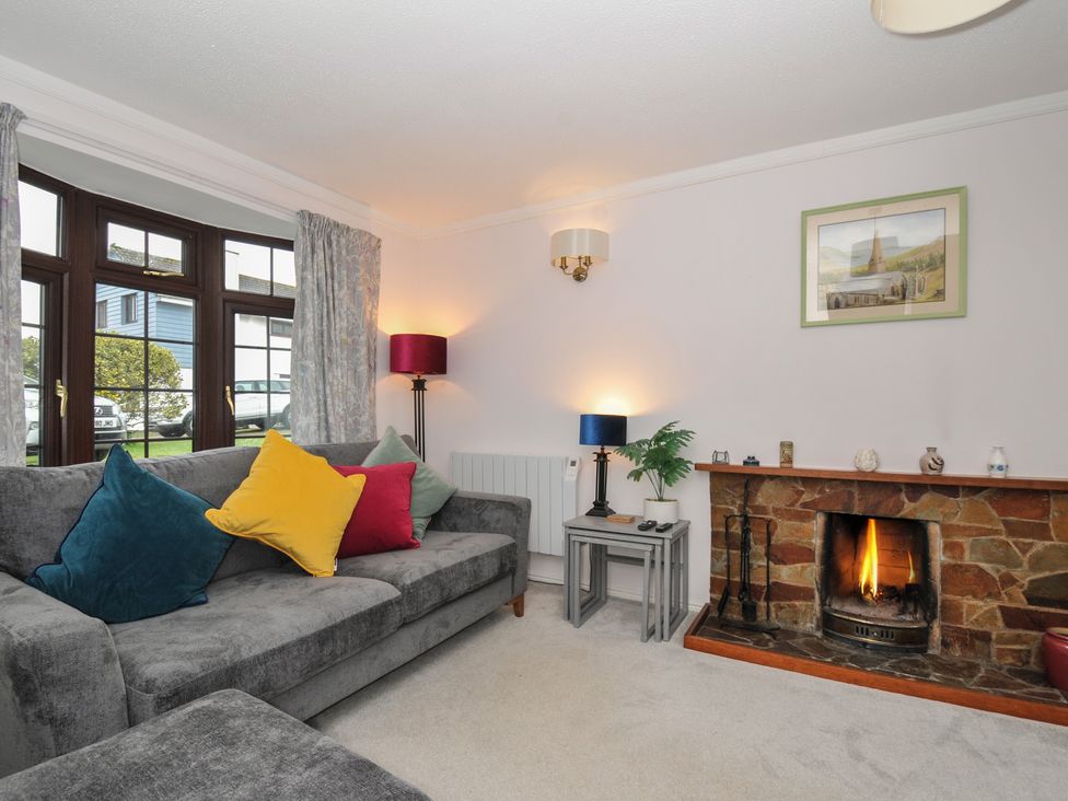 A living room with a sofa and fireplace at Hazelhurst in Rock