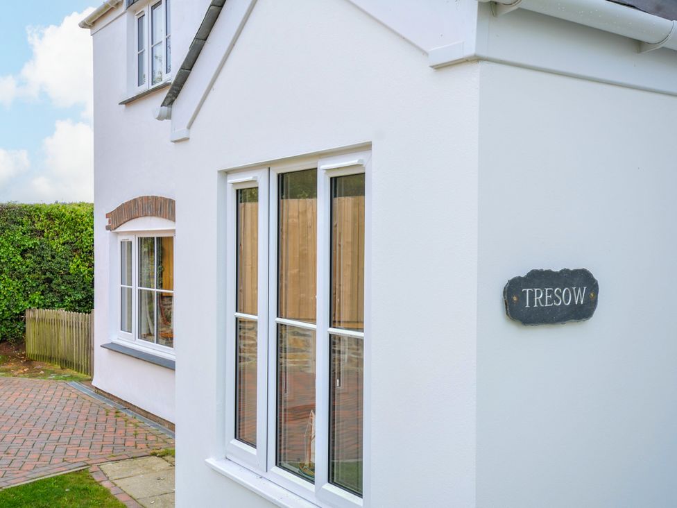 An exterior view of a house with a sign stating Tresow at Tresow in Rock
