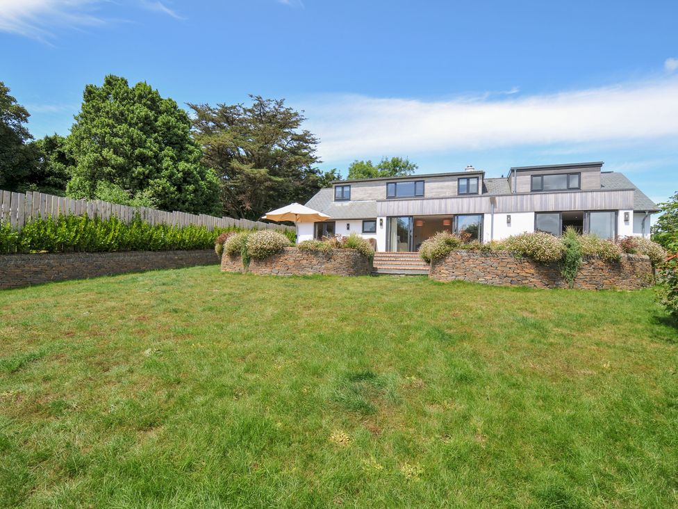 A house with a garden and trees at Porthilly Brook in Rock