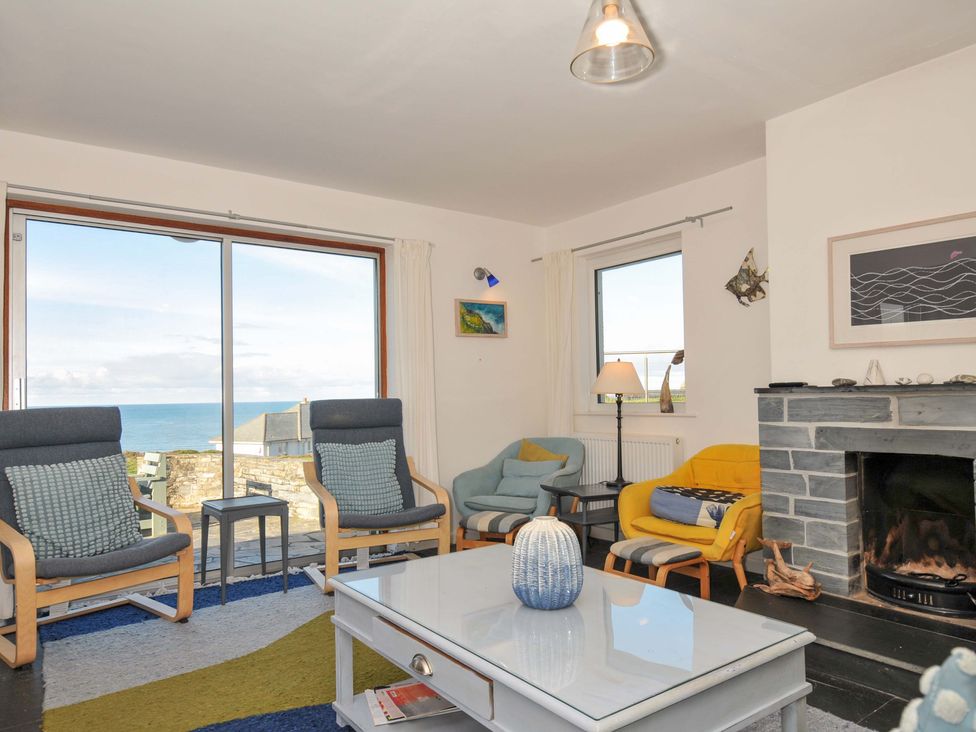 A living room with a view of the sea at Upper Gren in Trebetherick
