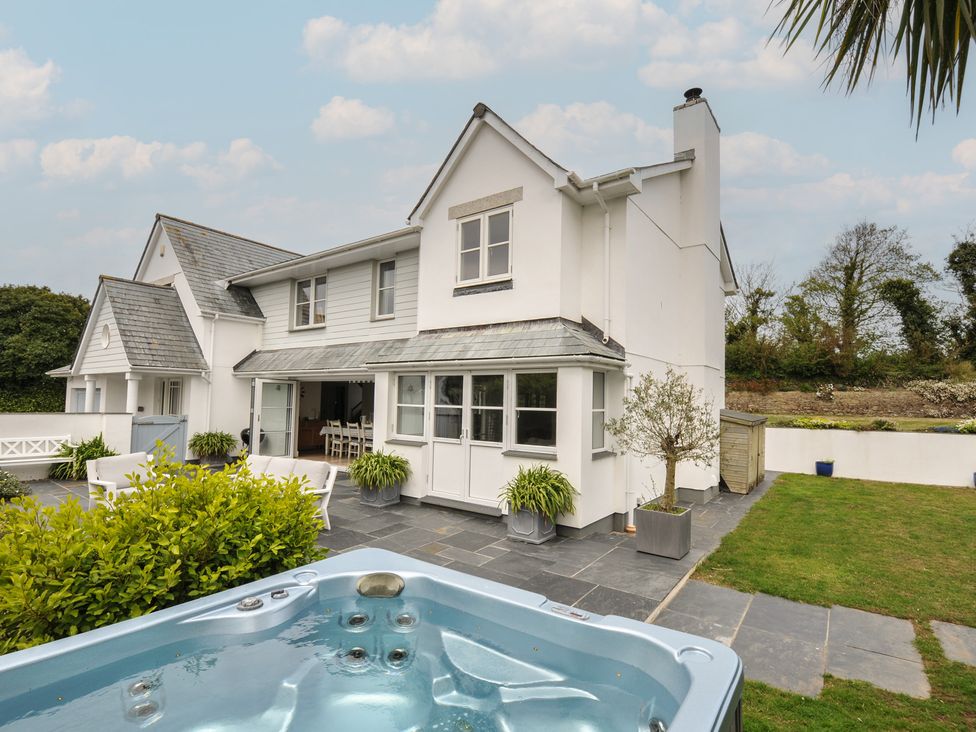 A house with a hot tub and patio area at Cherrytrees in Rock
