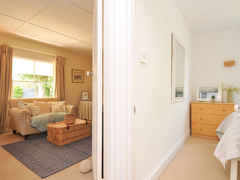 A living room with a sofa and coffee table at Sandy Lodge Rock