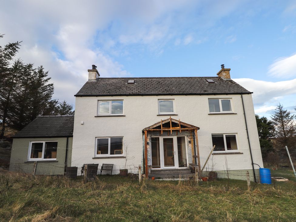 A house with windows and a door at Free Presbyterian Manse in Kinlochbervie
