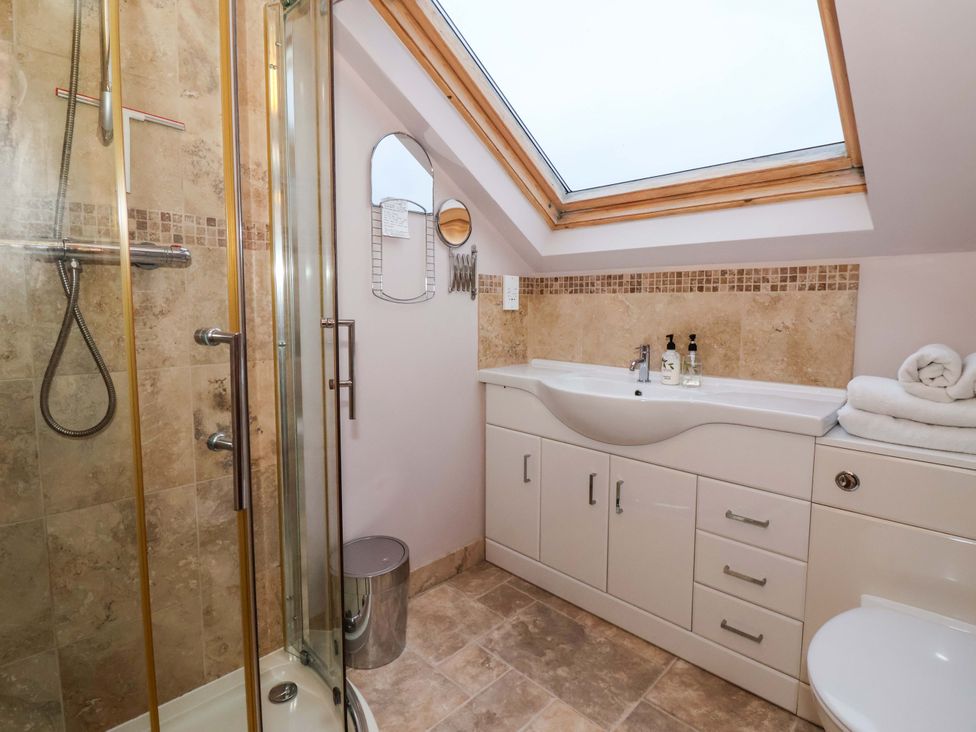 A bathroom with sink and shower at Brush and Boot in York
