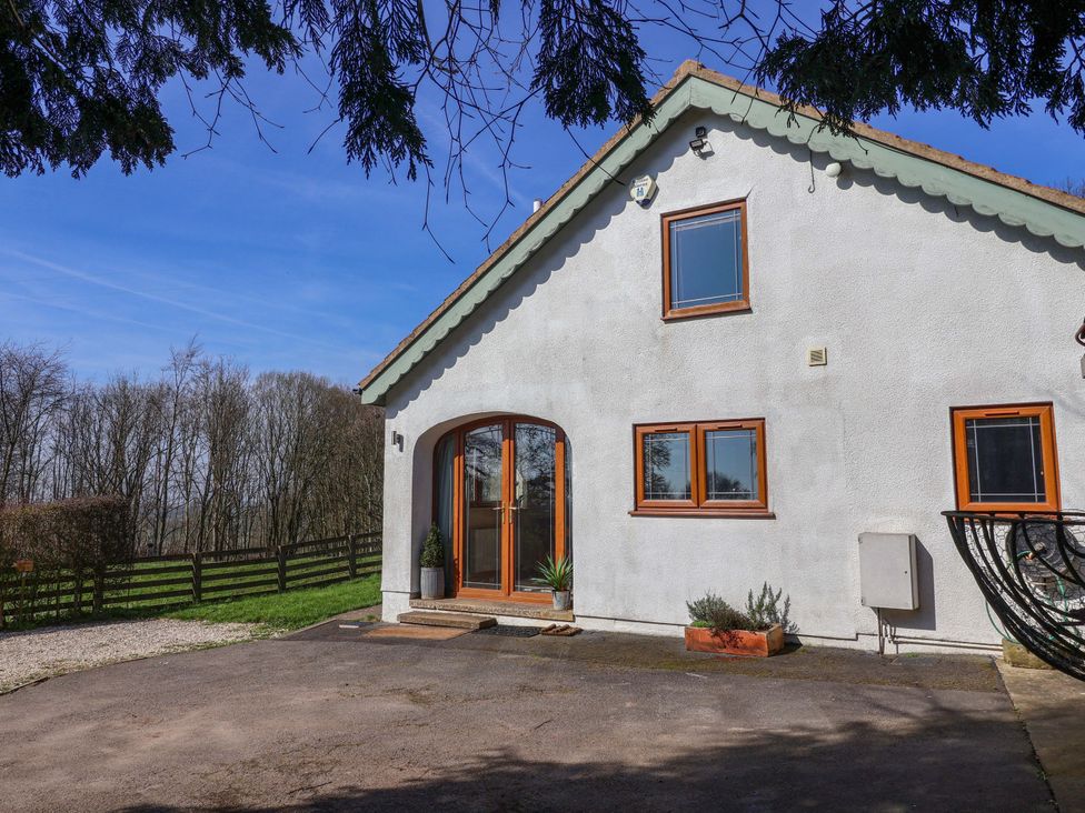A house exterior with a front door and windows at Brush and Boot in Stittenham near York