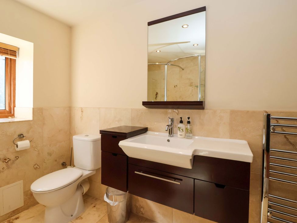 A bathroom with a sink and toilet at Brush and Boot Stittenham near York