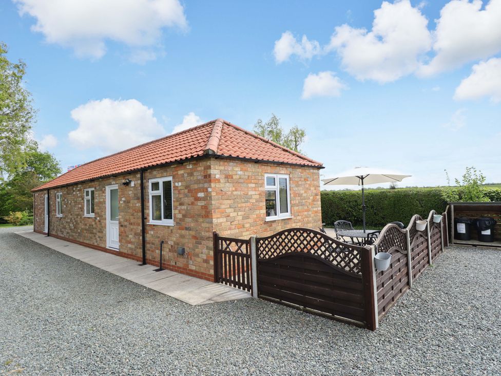 A house with a patio area and garden at The New Build in South Reston near Louth