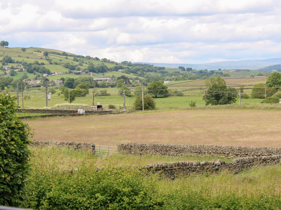 A view of hills and fields at Farnhill View in Cross Hills