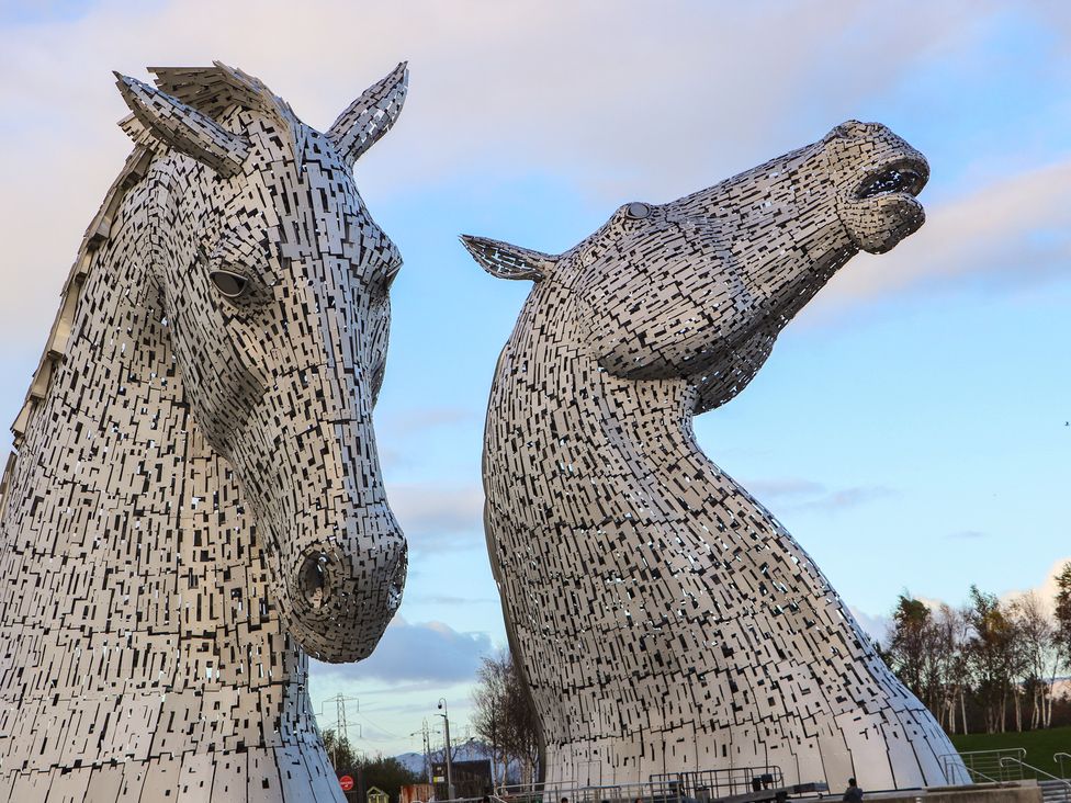 Two horse sculptures in an outdoor setting at The Barn, Drumbow Farm, Caldercruix