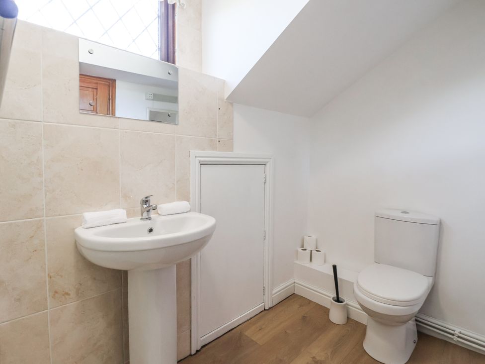 A bathroom with a sink and toilet at East Cottage in East Knapton near Rillington