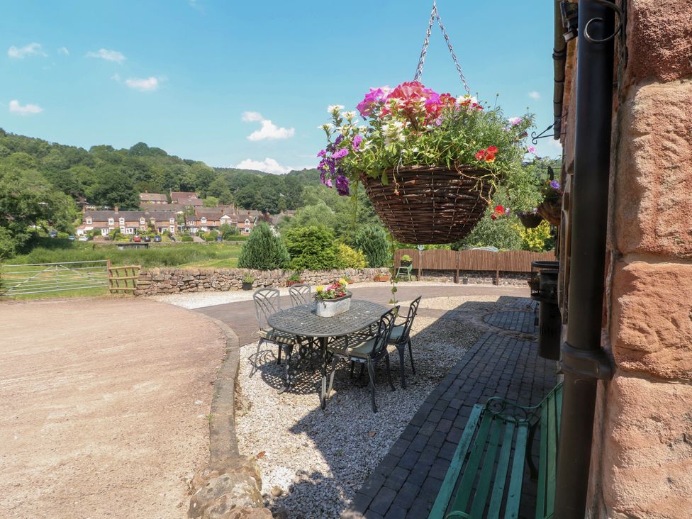 An outdoor area with a table and chairs at Bluebell Barn Stoke-on-Trent