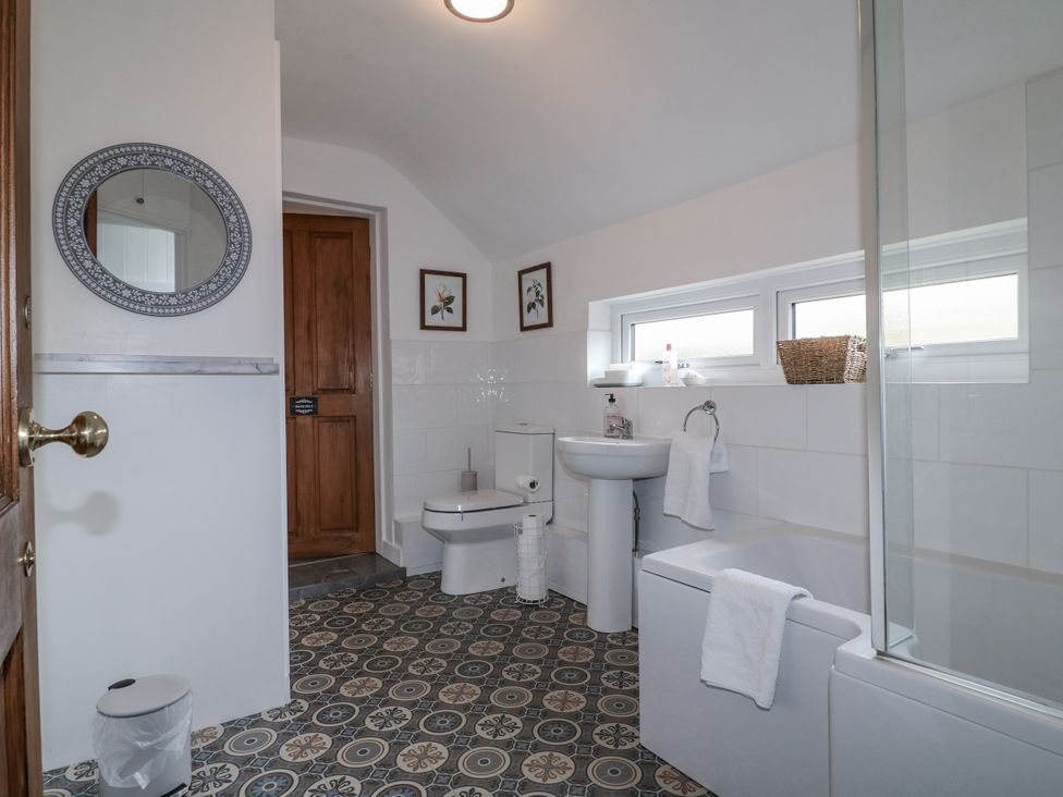 A bathroom with a sink and toilet at Yoxall Cottage in Stoke-on-Trent