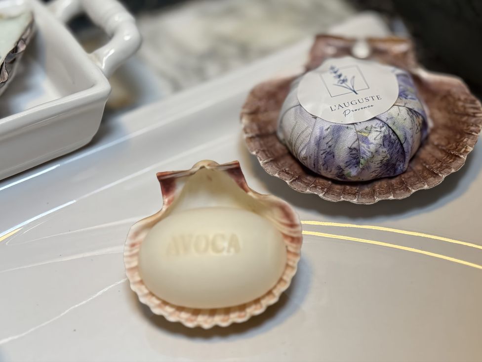 A soap in a shell dish with a label at The Captain's Nest in Bunbeg, County Donegal