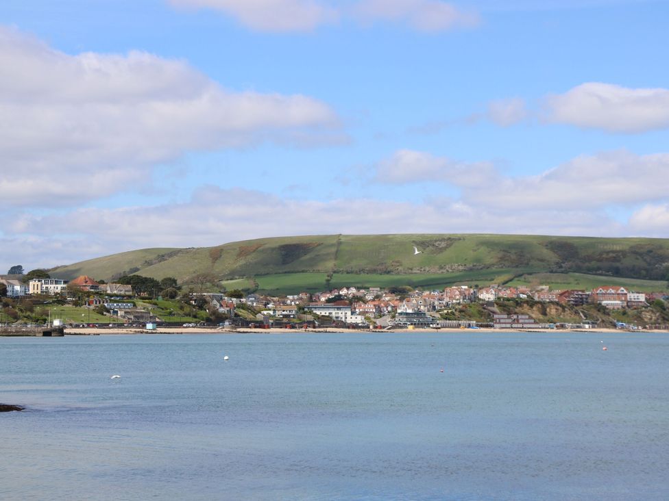A coastal view with hills and houses at The Barn in Lytchett Matravers
