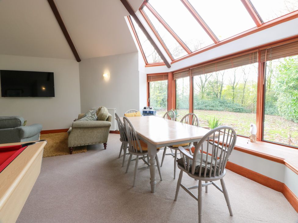 A dining room with a table and chairs at Shieldhill Farm House Falkirk