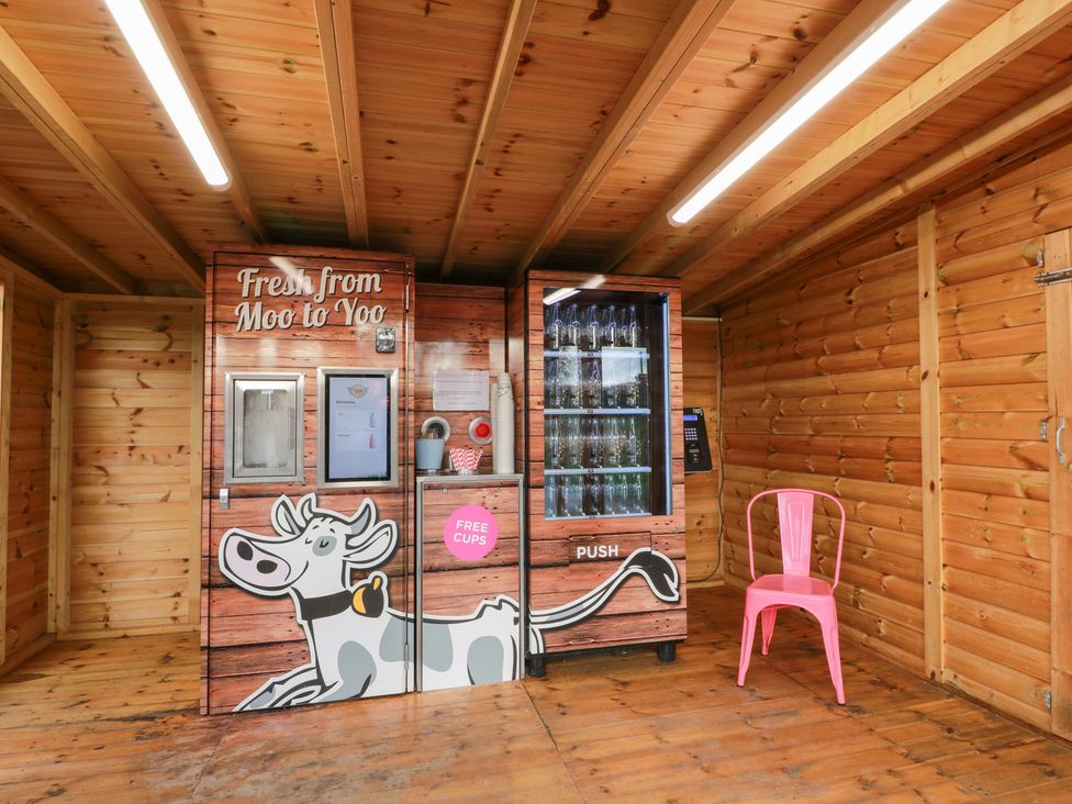 A milk vending machine and chair at Shieldhill Farm House in Falkirk