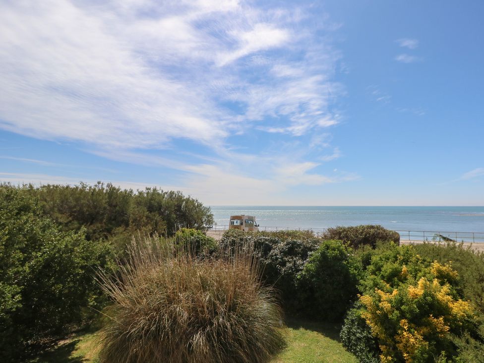 View of the ocean from a garden at Bella vista in Selsey, West Sussex