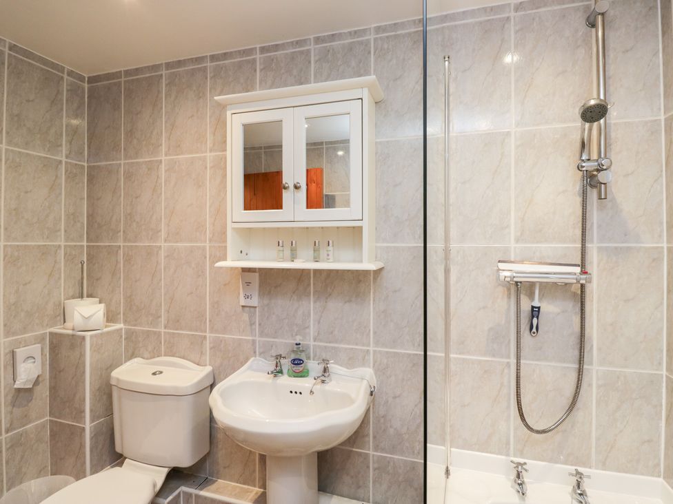 A bathroom with a sink and shower at Low Dow Crag in Coniston