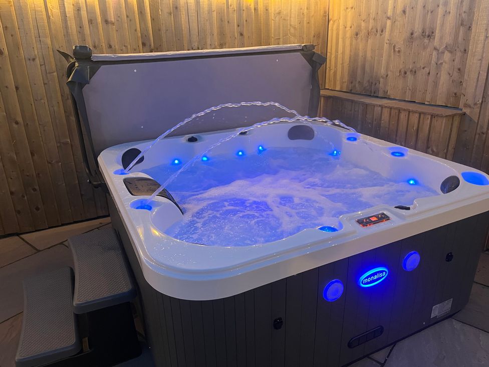 A hot tub with water jets and LED lights at Gilfach Abersoch