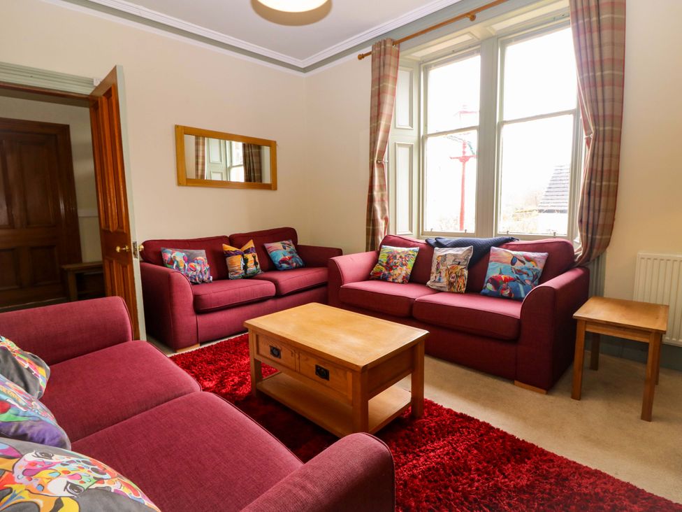 A living room with sofas and a coffee table at Tayview in Killin