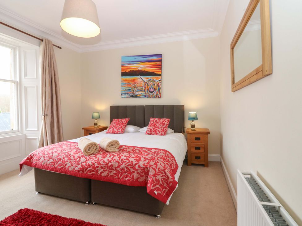 A bedroom with a double bed and bedside tables at Tayview in Killin